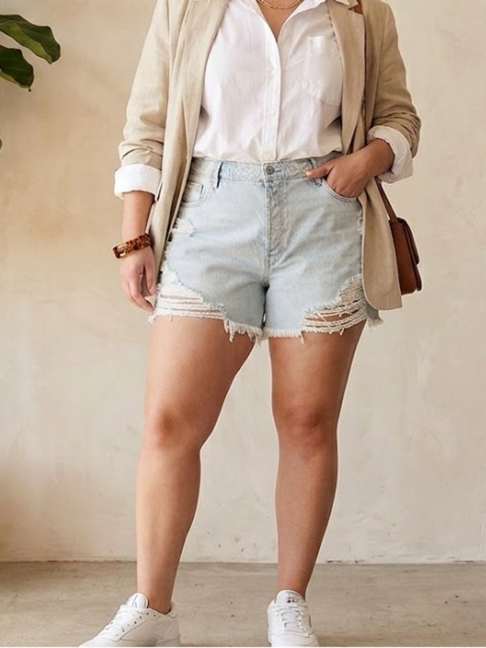 Good American Light Wash Distressed Jean Shorts